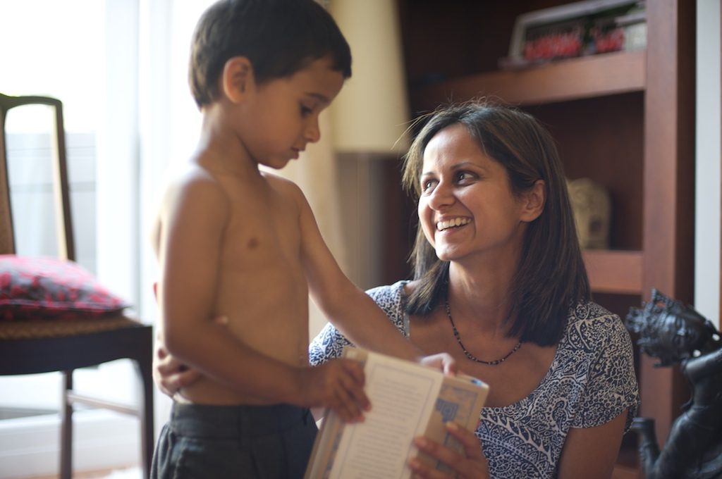 Gouri with child during meditation class